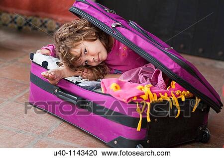 Girl in a suitcase View Large Photo Image Stock Image - Girl in a suitcase. Fotosearch