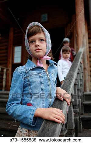 Girl in a Togliatty Church, Samara Region, Russia View Large Photo Image Stock Photo - Girl in a Togliatty Church, Samara Region, Russia. Fotosearch