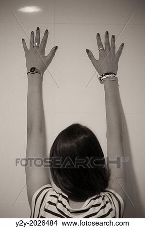 Girl in a wall. View Large Photo Image Picture - Girl in a wall.. Fotosearch