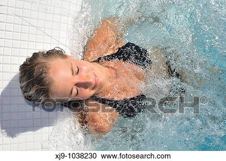 Girl in a whirlpool under the sun View Large Photo Image Stock Image - Girl in a whirlpool under the sun. Fotosearch