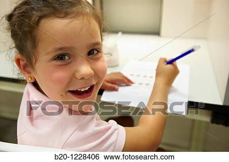 Stock Photograph - Girl in a yoghurt tasting session, AZTI-Tecnalia Marine and Food Research Center, Derio, Bizkaia, Euskadi, Spain. Fotosearch
