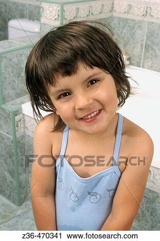 Girl in bathroom smiling View Large Photo Image Stock Image - Girl in bathroom smiling. Fotosearch