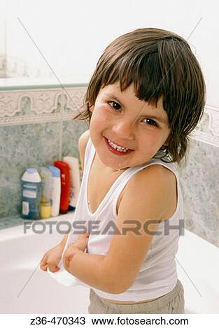 Girl in bathroom smiling View Large Photo Image Stock Image - Girl in bathroom smiling. Fotosearch