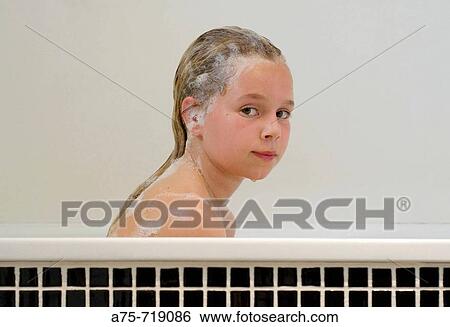 Girl in bathtub View Large Photo Image Stock Photograph - Girl in bathtub. Fotosearch