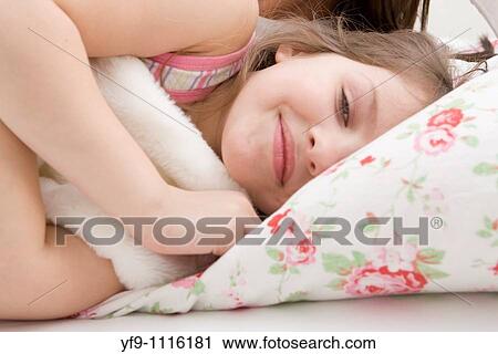 Girl in bed. View Large Photo Image Stock Image - Girl in bed.. Fotosearch