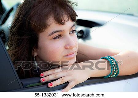Girl in car View Large Photo Image Stock Image - Girl in car. Fotosearch