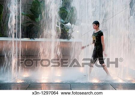 Girl in fountain, PPG Plaza in Pittsburgh View Large Photo Image Picture - Girl in fountain, PPG Plaza in Pittsburgh. Fotosearch