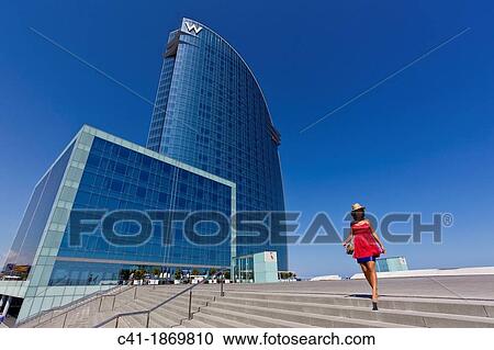 Girl in front of W Hotel Barcelona, Spain View Large Photo Image Stock Image - Girl in front of W Hotel Barcelona, Spain. Fotosearch