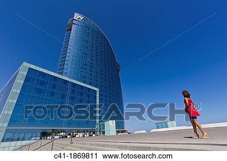 Girl in front of W Hotel Barcelona, Spain View Large Photo Image Stock Image - Girl in front of W Hotel Barcelona, Spain. Fotosearch