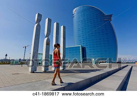 Girl in front of W Hotel Barcelona, Spain View Large Photo Image Stock Photo - Girl in front of W Hotel Barcelona, Spain. Fotosearch