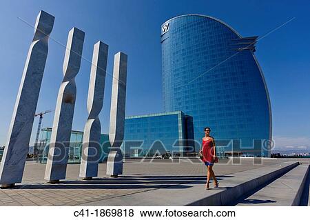 Girl in front of W Hotel Barcelona, Spain View Large Photo Image Stock Photo - Girl in front of W Hotel Barcelona, Spain. Fotosearch