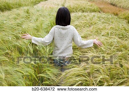 Girl in grain field. Arkaute, Alava, Euskadi, Spain View Large Photo Image Stock Image - Girl in grain field. Arkaute, Alava, Euskadi, Spain. Fotosearch