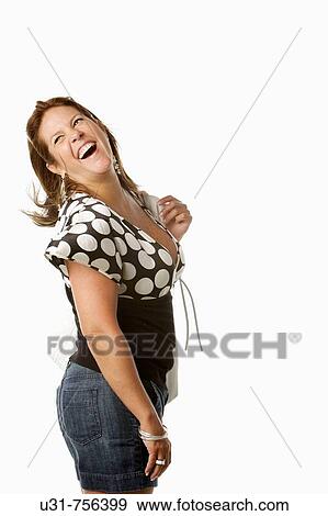 Girl in her late 30s in a studio setting smiling View Large Photo Image Stock Photo - Girl in her late 30s in a studio setting smiling. Fotosearch