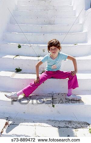 Stock Image - Girl in Naxos, Cyclades Islands, Greece. Fotosearch