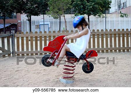 Girl in playground View Large Photo Image Stock Photography - Girl in playground. Fotosearch