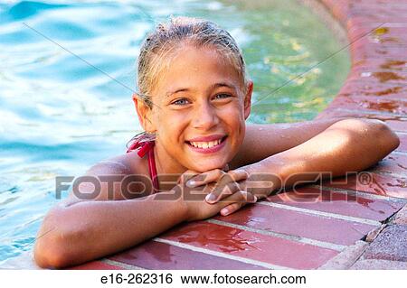 Girl in pool View Large Photo Image Stock Photograph - Girl in pool. Fotosearch