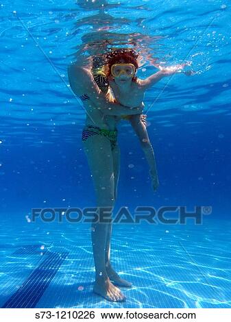 Girl in pool View Large Photo Image Stock Photograph - Girl in pool. Fotosearch