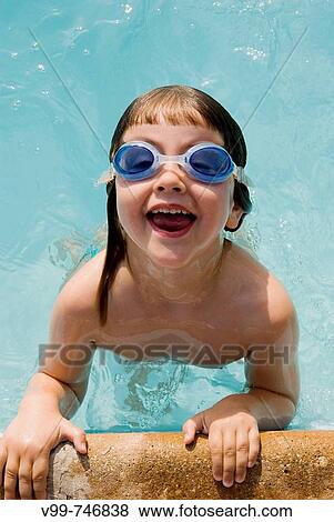 Girl in swimming pool View Large Photo Image Stock Photo - Girl in swimming pool. Fotosearch