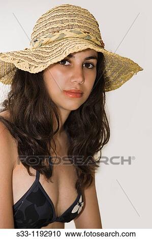 Girl in swimsuit with pamela View Large Photo Image Stock Image - Girl in swimsuit with pamela. Fotosearch