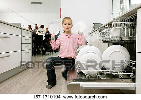 Girl in the kitchen View Large Photo Image Picture - Girl in the kitchen. Fotosearch