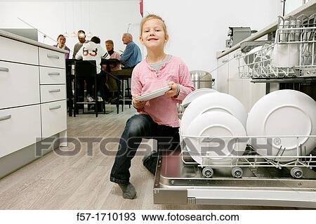 Girl in the kitchen View Large Photo Image Stock Image - Girl in the kitchen. Fotosearch