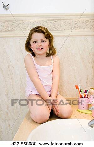 Girl in underwear in the bathroom View Large Photo Image Stock Image - Girl in underwear in the bathroom. Fotosearch