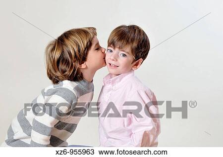 girl kisses a boy View Large Photo Image Stock Image - girl kisses a boy. Fotosearch