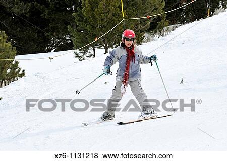Girl learning to ski at snow, Chica aprendiendo a esquiar en la nieve, Andorra, Europe View Large Photo Image Stock Photo - Girl learning to ski at snow, Chica aprendiendo a esquiar en la nieve, Andorra, Europe. Fotosearch