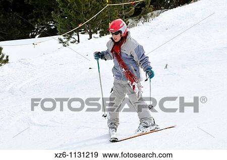 Girl learning to ski at snow, Chica aprendiendo a esquiar en la nieve, Andorra, Europe View Large Photo Image Stock Photo - Girl learning to ski at snow, Chica aprendiendo a esquiar en la nieve, Andorra, Europe. Fotosearch