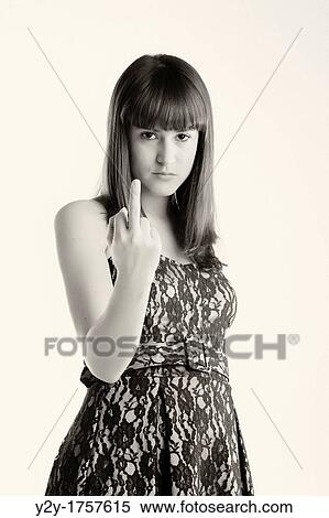 Girl lifting the ring finger View Large Photo Image Stock Photography - Girl lifting the ring finger. Fotosearch