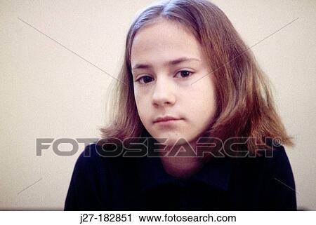 Stock Image - Girl looking sad, lonely. Fotosearch