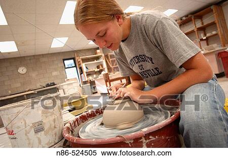 Girl making clay bowl at the University of Evansville. Indiana, USA View Large Photo Image Stock Photography - Girl making clay bowl at the University of Evansville. Indiana, USA. Fotosearch