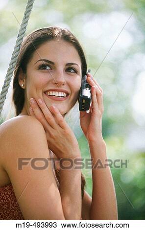 girl on a cell phone View Large Photo Image Stock Image - girl on a cell phone. Fotosearch