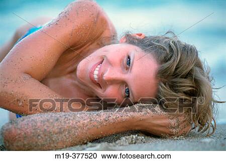 girl on a sandy beach View Large Photo Image Stock Image - girl on a sandy beach. Fotosearch