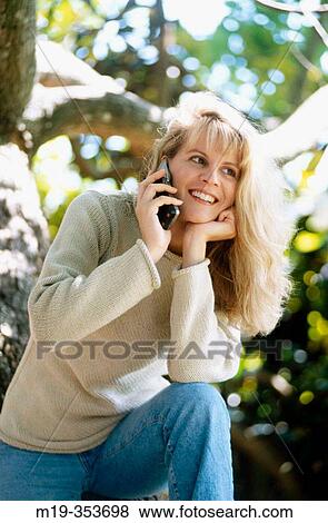 girl on cellular View Large Photo Image Stock Photo - girl on cellular. Fotosearch