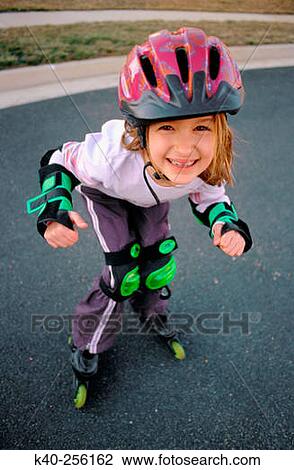 Girl on in-line skates View Large Photo Image Stock Image - Girl on in-line skates. Fotosearch