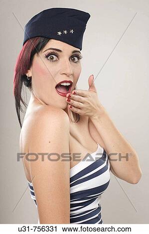 Girl on military outfit looking tenderly surprised at the camera View Large Photo Image Stock Image - Girl on military outfit looking tenderly surprised at the camera. Fotosearch