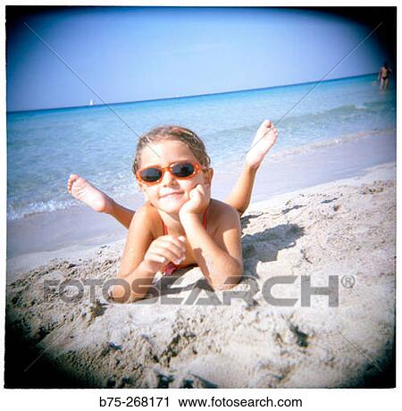 Girl on the beach View Large Photo Image Stock Image - Girl on the beach. Fotosearch