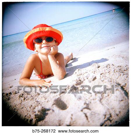 Girl on the beach View Large Photo Image Stock Image - Girl on the beach. Fotosearch