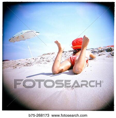 Girl on the beach View Large Photo Image Stock Image - Girl on the beach. Fotosearch