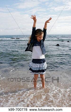 Girl on the beach, Tarifa. Cadiz province, Andalusia, Spain View Large Photo Image Stock Photo - Girl on the beach, Tarifa. Cadiz province, Andalusia, Spain. Fotosearch