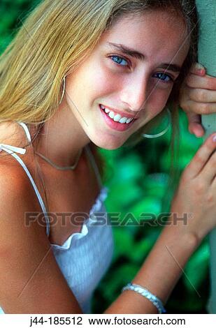 Stock Image - Girl outdoor smiling. Fotosearch