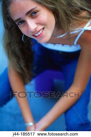 Stock Photo - Girl outdoor smiling. Fotosearch