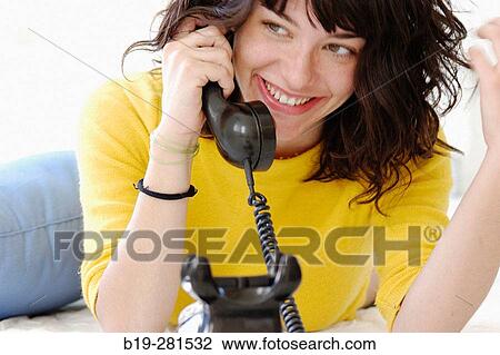Girl phoning View Large Photo Image Stock Image - Girl phoning. Fotosearch