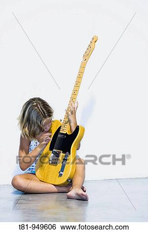 girl playing electric guitar View Large Photo Image Stock Photograph - girl playing electric guitar. Fotosearch