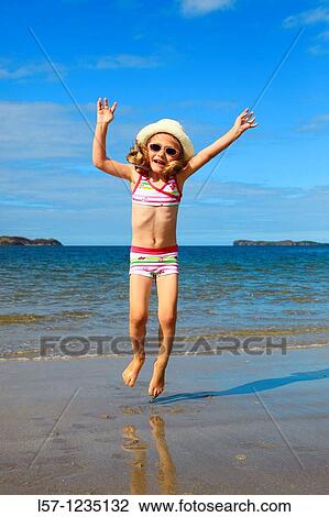girl playing on sandy beach, Sutherland, Scotland View Large Photo Image Stock Image - girl playing on sandy beach, Sutherland, Scotland. Fotosearch