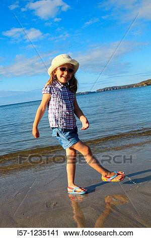 girl playing on sandy beach, Sutherland, Scotland View Large Photo Image Stock Image - girl playing on sandy beach, Sutherland, Scotland. Fotosearch