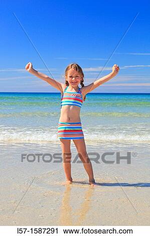 girl playing on sandy beach, Sutherland, Scotland View Large Photo Image Stock Image - girl playing on sandy beach, Sutherland, Scotland. Fotosearch