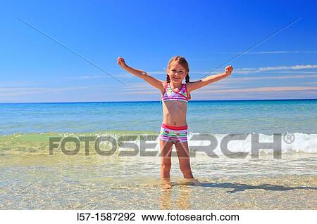 girl playing on sandy beach, Sutherland, Scotland View Large Photo Image Stock Image - girl playing on sandy beach, Sutherland, Scotland. Fotosearch