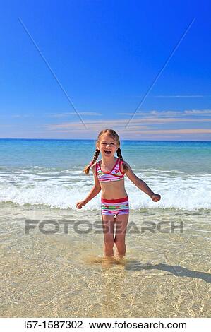 girl playing on sandy beach, Sutherland, Scotland View Large Photo Image Stock Image - girl playing on sandy beach, Sutherland, Scotland. Fotosearch